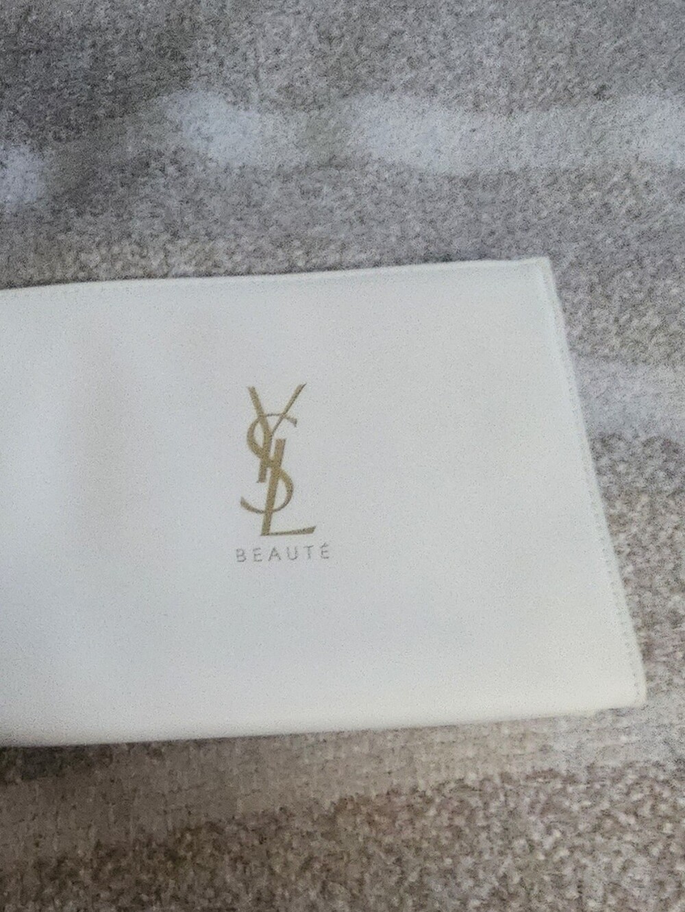Yves Saint Laurent White Cosmetic Pouch with Gold Logo